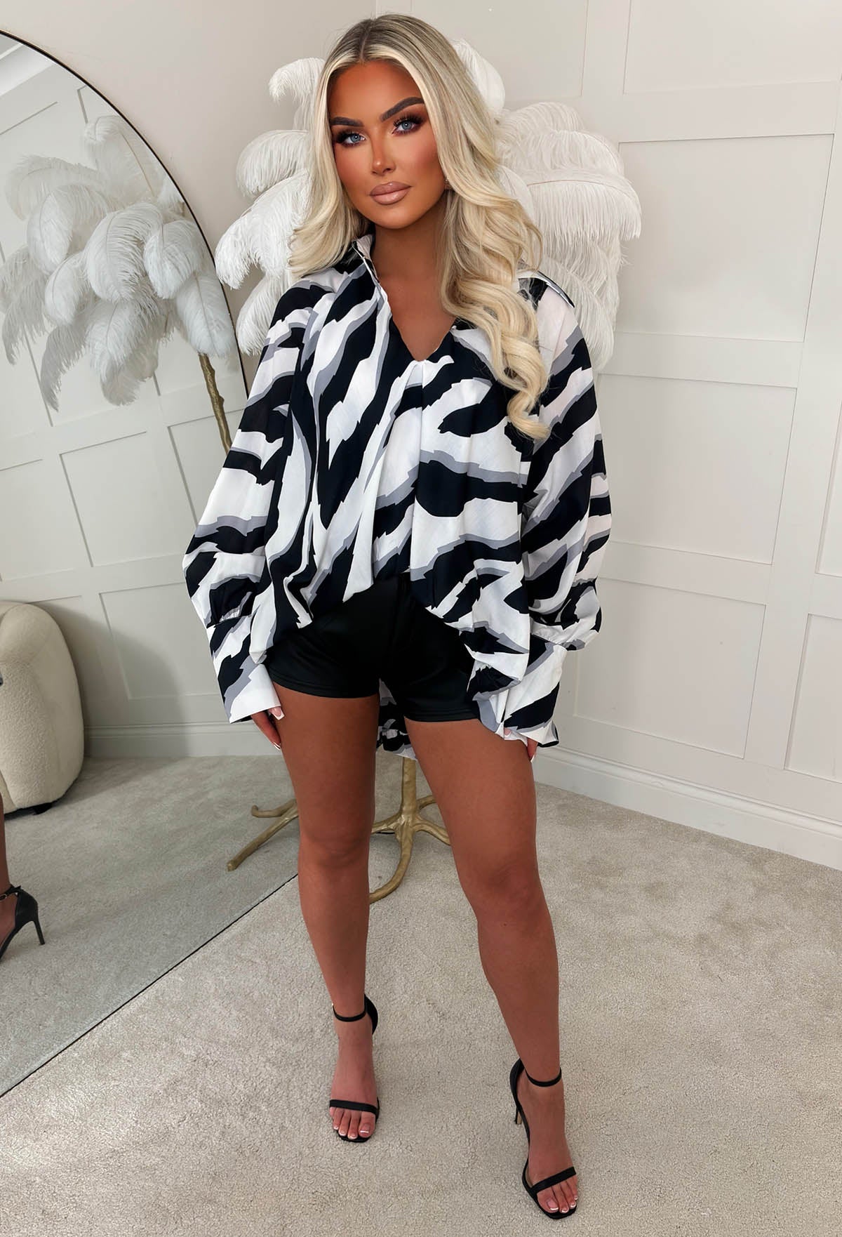 Let Loose Black Zebra Print Blouse